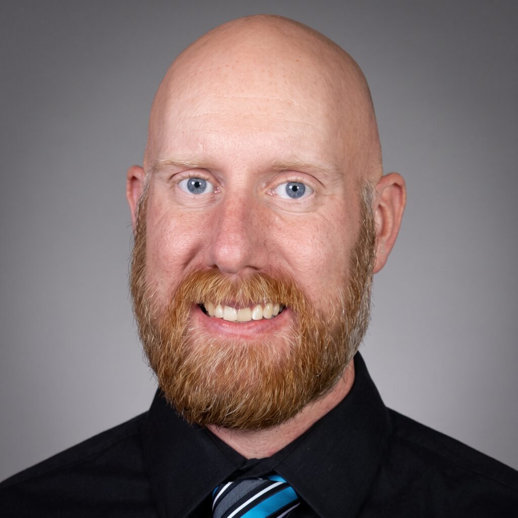 headshot on gray background