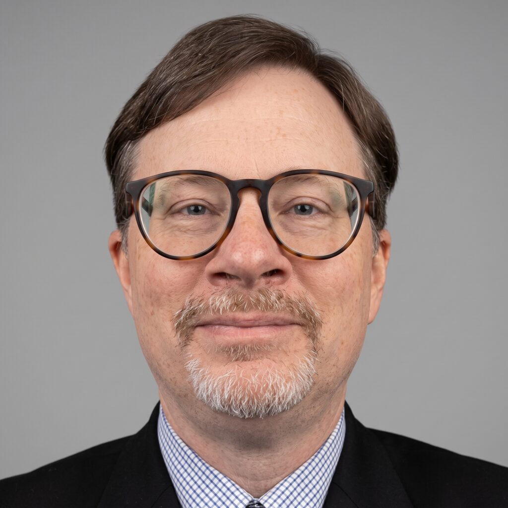 headshot on grey background