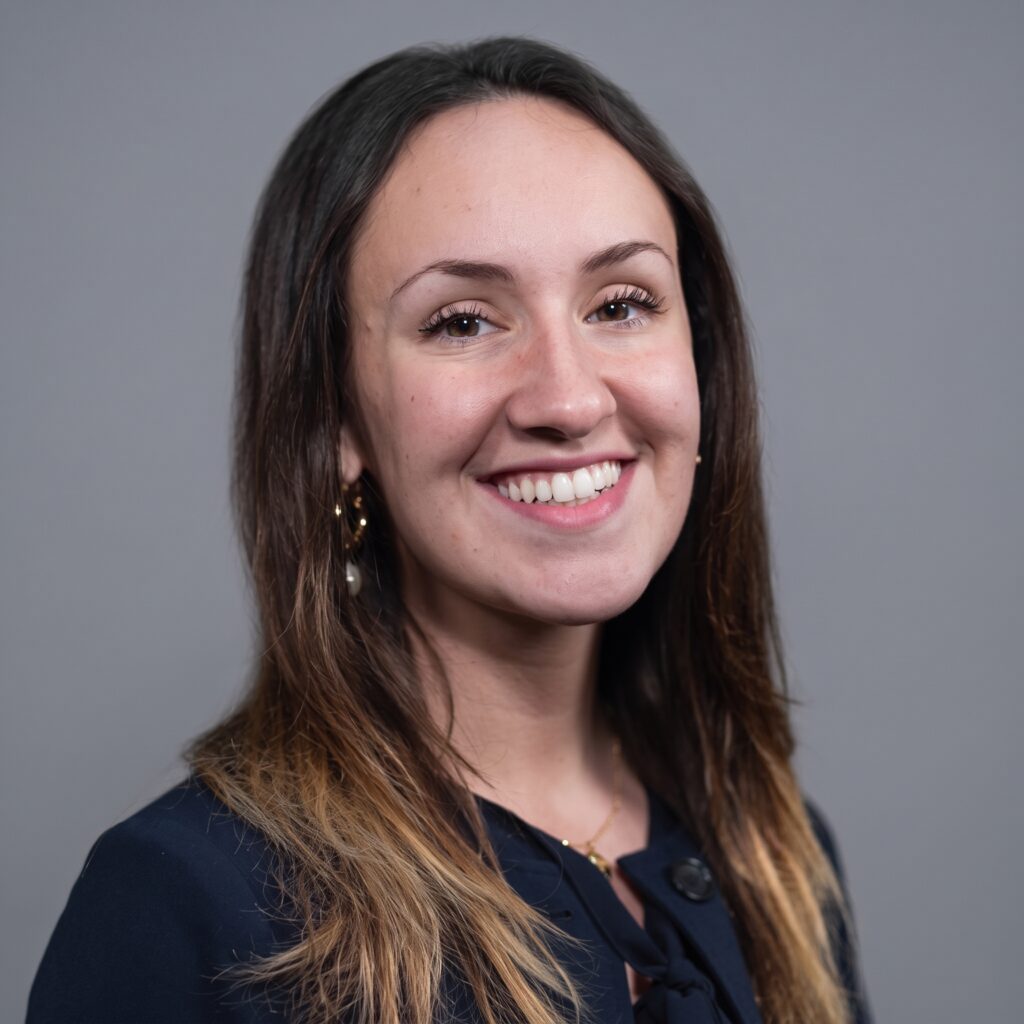 headshot on grey background